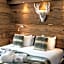 Hôtel Ski Lodge - Chambres & Appartements - Village Montana