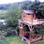 Cabane Perchée dans la prairie de l'ancien moulin