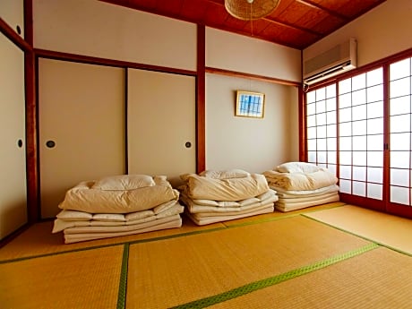 Single Bed in Dormitory Room