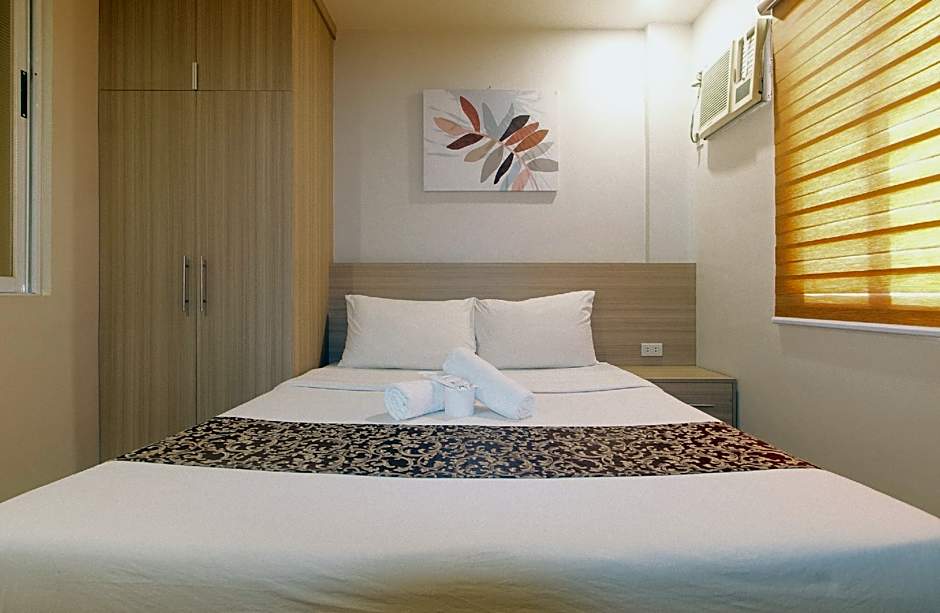 Photo 1 of 50 of Elyseah Condotel by RedDoorz