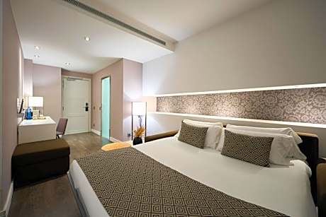 Quadruple Room (2 Adults + 2 Children)