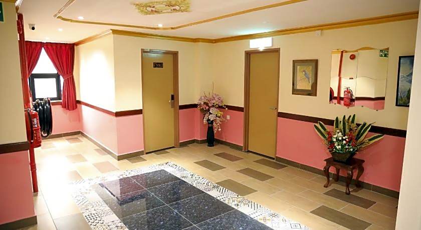 Capital O 90897 Island City Hotel