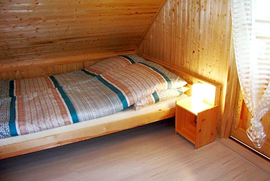 Sztil - Apartamenty i drewniane domki