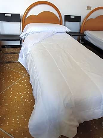 Single Bed in Dormitory Room