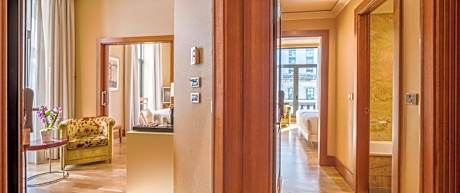 Family Adjoining Room (3 Adults + 1 Child)