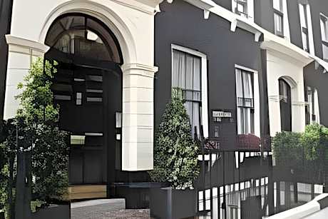 Quadruple Room with Shared Bathroom