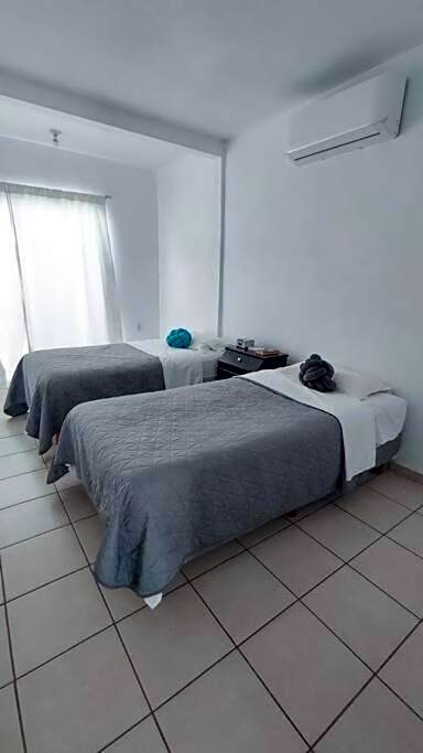 Hogar tranquilo, cerca de marina y plaza comercial