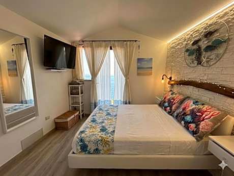 Oasi del Relax - Seaside Peaceful Panoramic Terrace in ITALY - new Sardinia apartment 50 mt beach&sea full comfort air conditioning-WiFi-Parking-Privacy