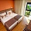 Essence Inn Marianos Hotel