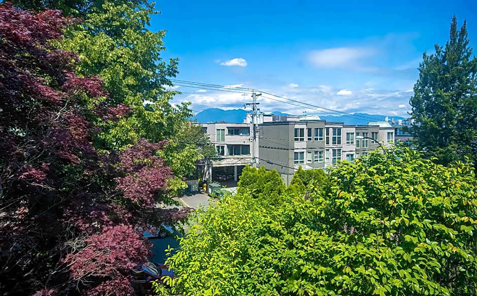 Charming Home Near UBC with Parking & Backyard