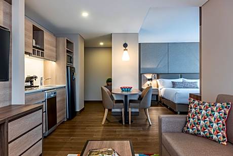 1 Bedroom Junior suite with 1 King, Sofa bed, City view