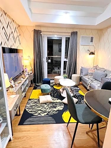 new fully furnished cozy 2 bedroom staycation condo unit with pool