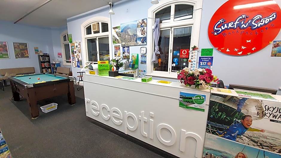 Surf 'N' Snow Backpackers Across Sky Tower