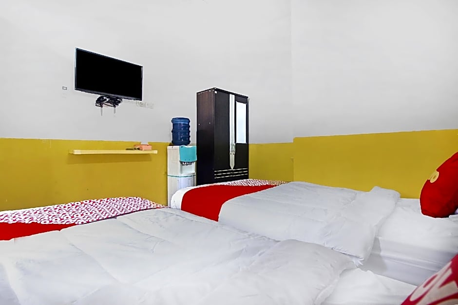 OYO 90307 Fj Alfaeyza Kost