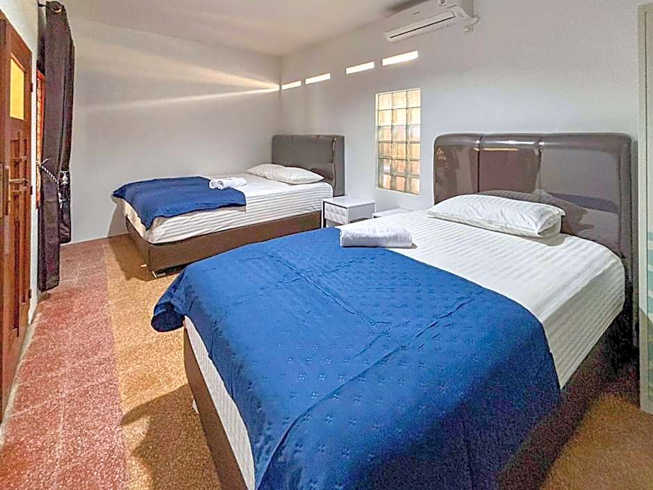 Tini's Guest House Malang Mitra RedDoorz