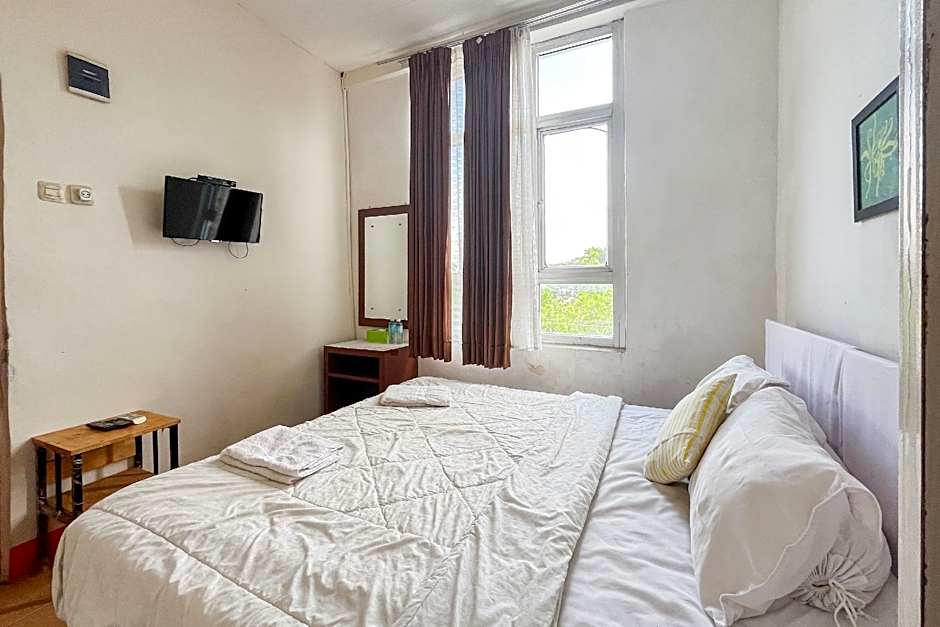 Urbanview Poma Hotel