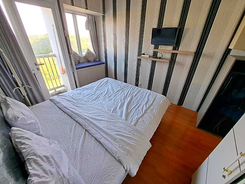 OYO Life 93106 Apartement Grand Sentraland By Andi