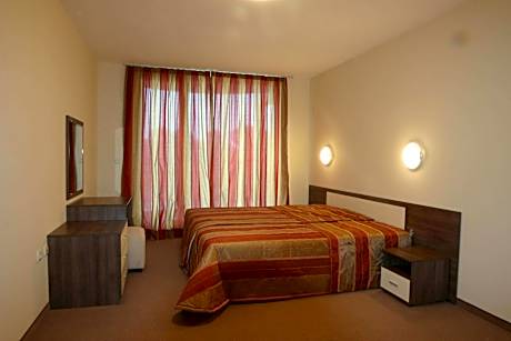 One-Bedroom Apartment (2 Adults + 2 Children)