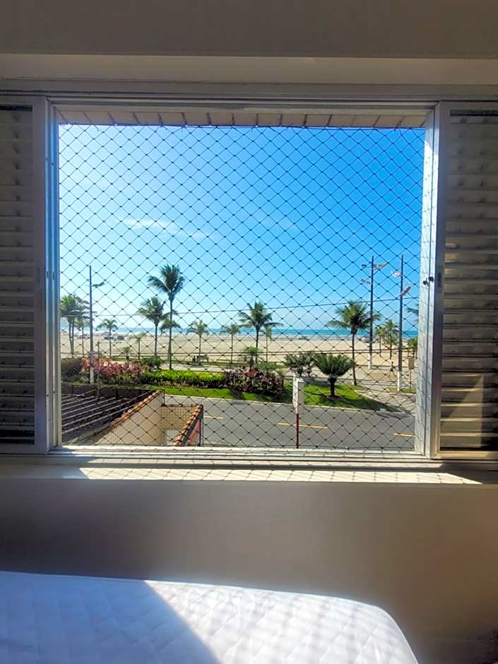 Apartamento Aconchego Frente Mar - Vila Guilhermina Praia Grande SP - Cozinha Completa - Climatizador de Ar - TV a Cabo - Wi-Fi