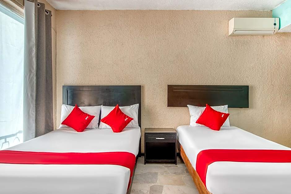 Capital O Hotel La Siesta