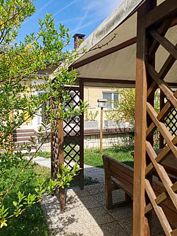 Fully equipped SIX BEDROOM HOUSE 15 kilometers from LAKE BLED - with a terrace, garden, playground, and parking