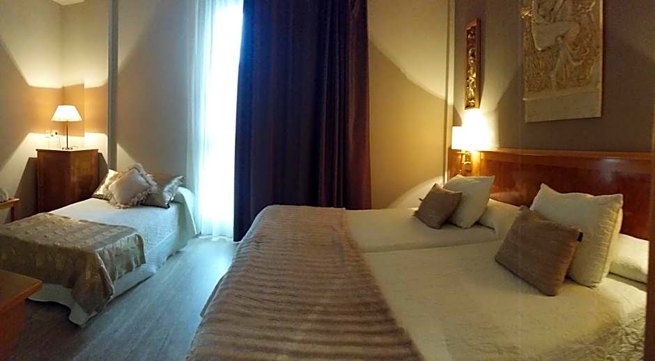 Photo 1 of 6 of Triple Room