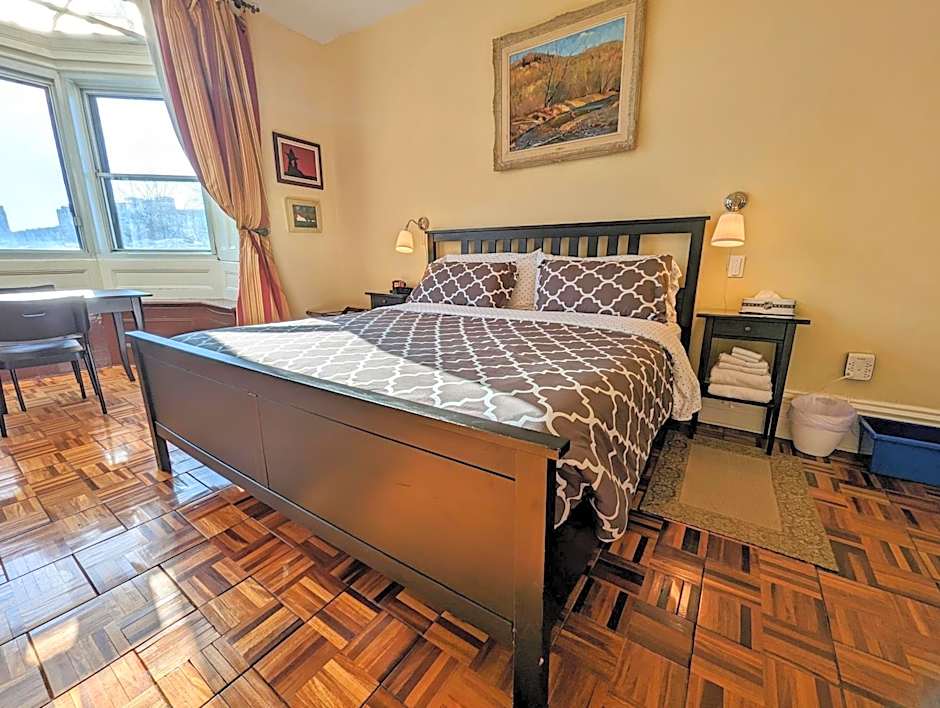 Photo 1 of 9 of Standard Double Room with Shared Bathroom