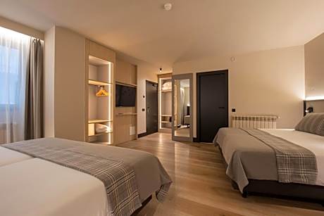 Quadruple Room (3 Adults + 1 Child)
