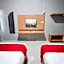 RedDoorz Plus @ New Favour Hotel Gunung Dempo