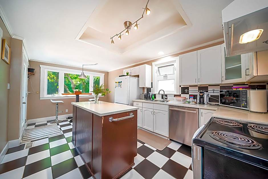 Charming Home Near UBC with Parking & Backyard