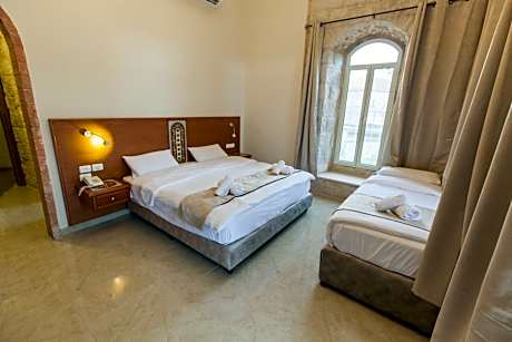 Family Room with Balcony (1 Double Bed + 1 Single Bed)