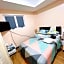 New Cozy 2 bedroom unit condotel for staycation with living room and kitchen set with pool