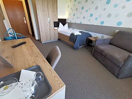 Einzelzimmer mit Zustellbett