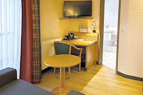 Premium Family Twin Room with Furnished Balcony and Sofa Bed