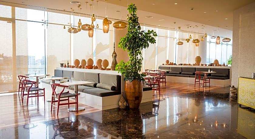Grand Millennium Muscat connected to Muscat Grand Mall