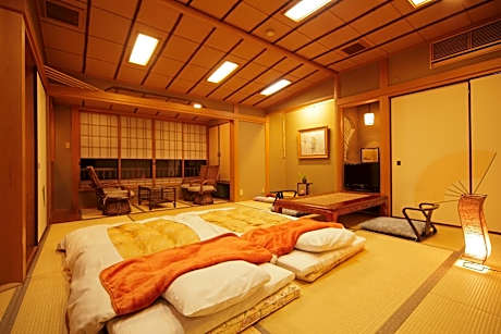 Japanese-Style Family Room with Shared Bathroom