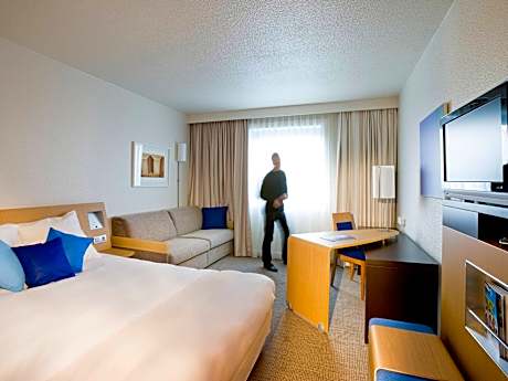 Non-smoking Classic Room with a queen-size bed and double sofa bed