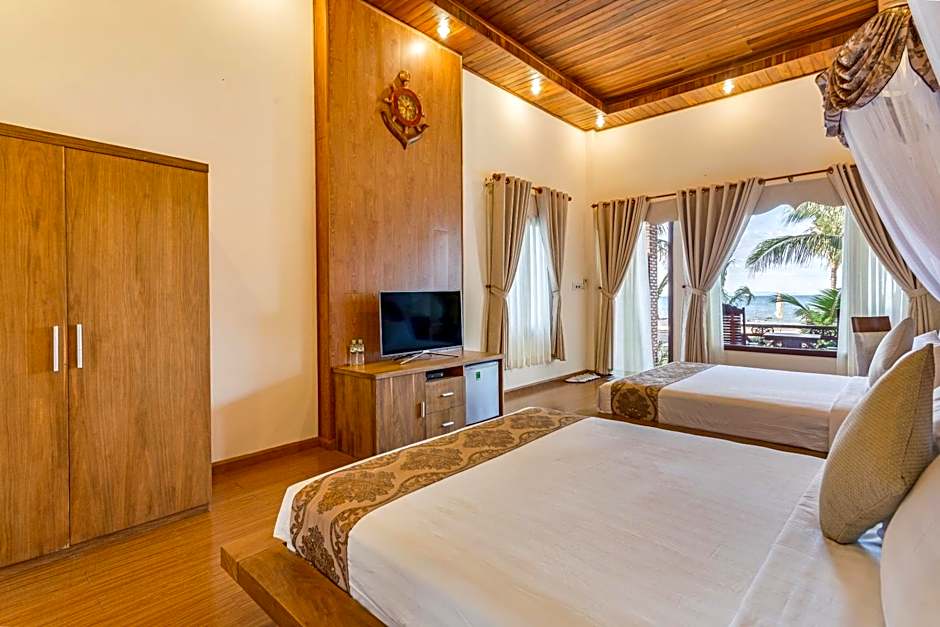 Photo 1 of 6 of Deluxe 2 Queen Beds, Beachfront