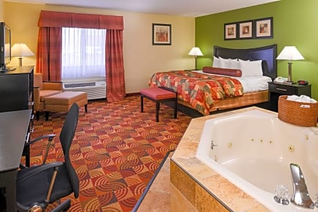 Suite-1 King Bed, Non-Smoking, Balcony, Whirlpool, Pillowtop Bed, Microwave And Refrigerator, Full Breakfast