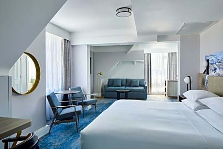 Deluxe Family Room with King Bed and Sofa Bed