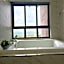 Imperio Residences Private Bathtub or Jacuzzi by Nestcove