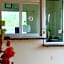 The Symphony Inn & Suites