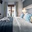 Meliton Inn Hotel & Suites by the beach