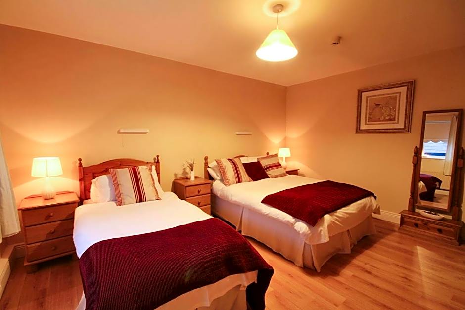 Photo 1 of 3 of Quadruple Room