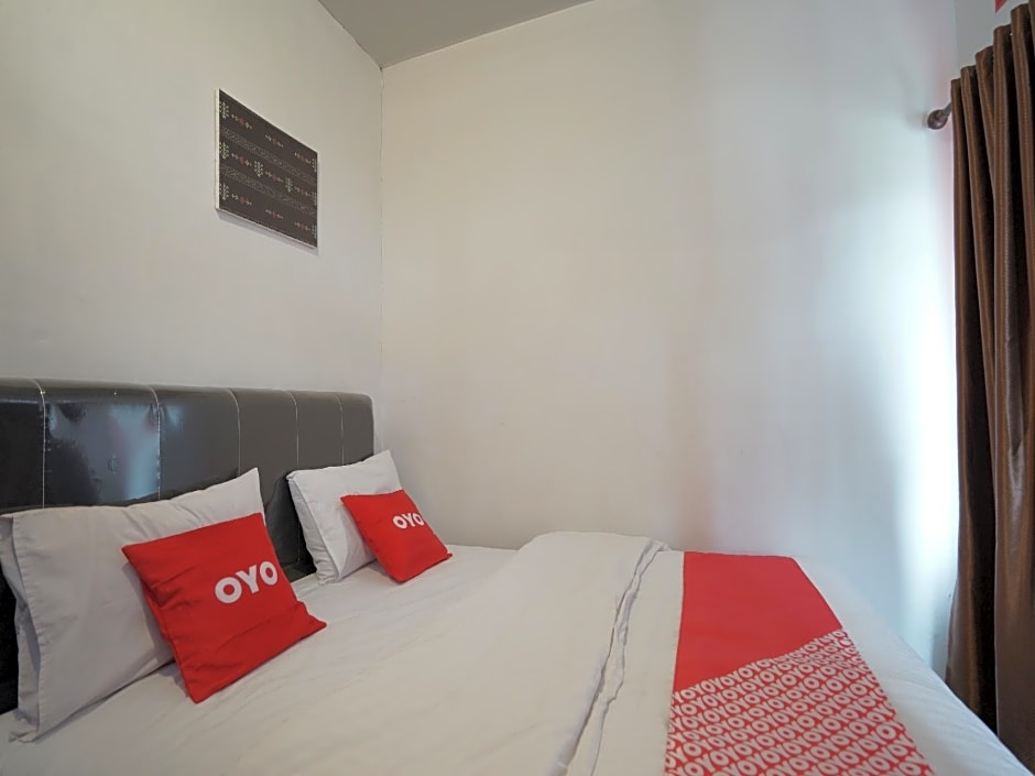 OYO 90645 Karisma Residence