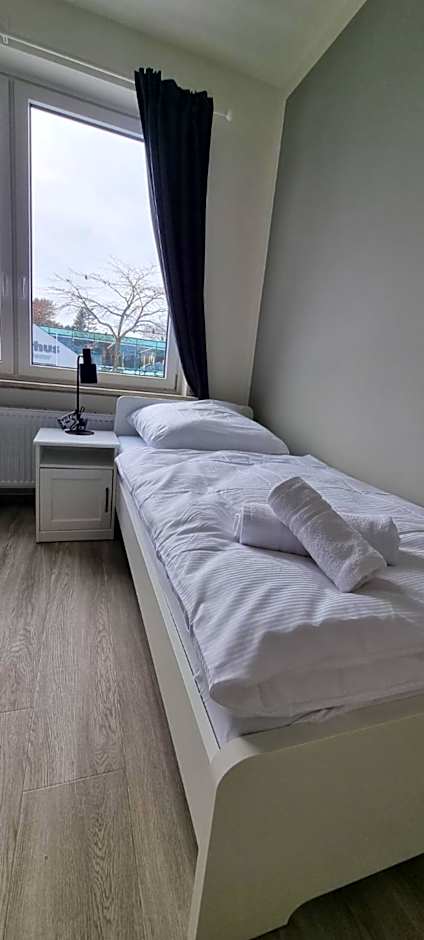 Zweibettzimmer "Grau" in zentraler Lage