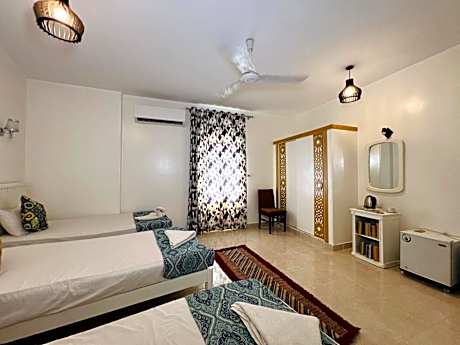 Deluxe Triple Room