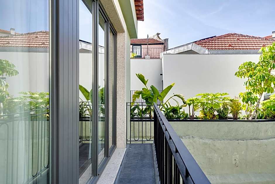 Portie Deluxe Suites by DA'HOME