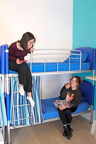Bed in 8-Bed Female Dormitory Room with Shared Bathroom  (age 18-36 years)
