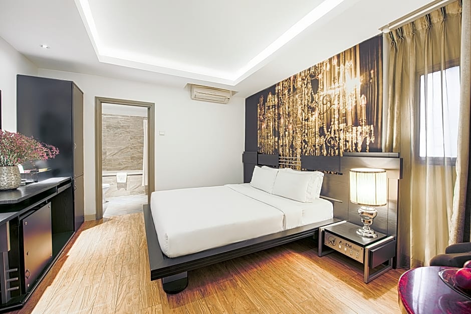 A & Em Corp - The Petit Hotel